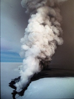 Clouds of steam spewing through a crevasse in Vatnajokull glacier, near Grimsvotn