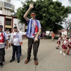 Turkish man Sultan Kosen, 28, has been confirmed by the Guinness World Record Association as the world's tallest man. (AP Photo/Javier Galeano)