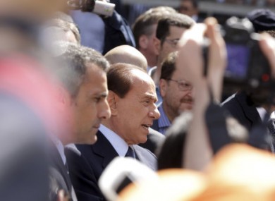 Silvio Berlusconi speaking to his supporters outside a court in Milan today.