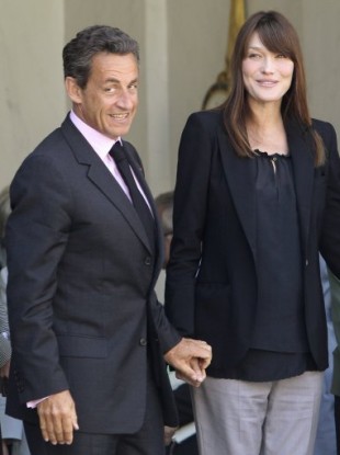 France's President Nicolas Sarkozy, and his wife Carla Bruni-Sarkozy, right, at the Elysee Palace in Paris, Friday, May 13