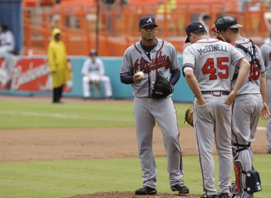 Atlanta Braves pitching coach Roger McDowell, right, unleashed a torent of gay slurs at San Francisco spectators..