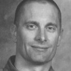 The FBI is offering a reward of up to 0,000 for information leading directly to the arrest of Robert William Fisher. 
Robert William Fisher is wanted for allegedly killing his wife and two young children and then blowing up the house in which they all lived in Scottsdale, Arizona in April of 2001. 
Fisher is physically fit and is an avid outdoorsman, hunter, and fisherman. He has a noticeable gold crown on his upper left first bicuspid tooth. He may walk with an exaggerated erect posture and his chest pushed out due to a lower back injury. Fisher is known to chew tobacco heavily. He has ties to New Mexico and Florida. Fisher is believed to be in possession of several weapons, including a high-powered rifle.
