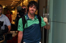 In the swing: this is the first of many for Rory