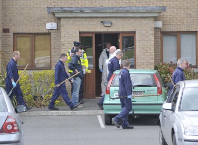 Gardaí at the scene of the shooting in Coolock yesterday