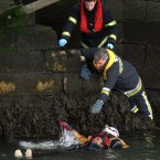 An unknown man is rescued after falling into the river Liffey in Dublin city centre in 2008.