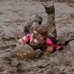 Myriam Vogt, 36, from France, playing in the team Highway to Love which lost to a team called The Mud Company, during the Swamp Soccer World Cup being held at Hunters Hall Park in Edinburgh. Pic: Andrew Milligan/PA