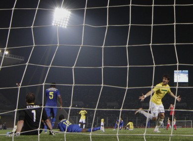 Alexandre Pato (right) celebrates scoring against Ecuador last night.