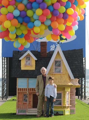 There have been previous replicas of the house, like this one at Cannes. Pictured are Charles Aznavour, French voice of Carl, and Tom Trouffier, French voice of Russell