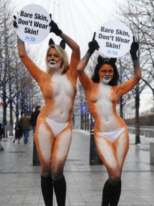 Monica Harris (right) and Victoria Eisermann pose for a PETA campaign against wearing fur.