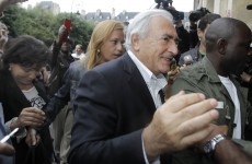 Strauss-Kahn returns to frosty reception and uncertain future