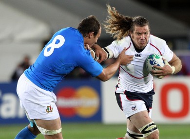 The United States' Todd Clever and Italy's Sergio Parisse share a moment.