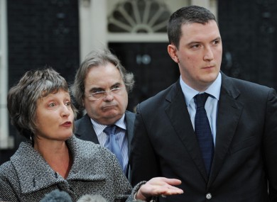The family of murdered solicitor Pat Finucane, including his widow Geraldine and son John (right) stand with their solicitor John Madden outside 10 Downing Street earlier.
