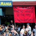 A tongue-in-cheek banner calls on the All Blacks fans to #OccupyAuckland.