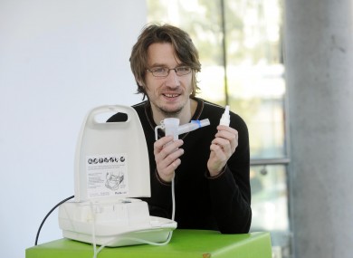 Cystic Fibrosis (CF) patient, Tomás Thompson pictured holding a Podhaler (right)