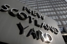 Serving police officer arrested in corruption probe