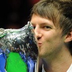 Judd Trump celebrates beating Northern Ireland's Mark Allen in the UK Championships in York. 