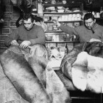 Tom Crean and Edgar Evans mending sleeping bags. (Topham Picturepoint/PA Images)