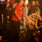 Dean Winstanley kisses a blow-up skeleton as he comes out for his second round match during the BDO World Professional Darts Championships at the Lakeside Complex, Surrey.