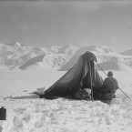 A photograph taken by Scott of Dr Edward Wilson sketching at Beardmore Glacier on 13 December 1911. (Courtesy of Scott Polar Research Institute, University of Cambridge)