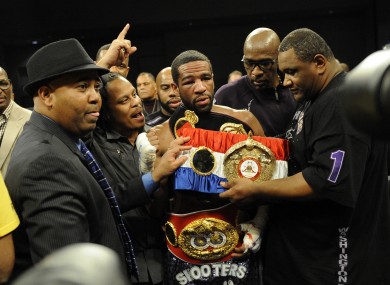 Mustafa Ameen close to the victorious Lamont Peterson