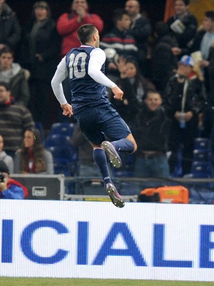 Clint Dempsey celebrates scoring the only goal of the game.