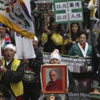 Tibetans living in Taiwan protest to mark the 53rd anniversary of the 1959 unsuccessful revolt against China that sent the Dalai Lama into exile. (AP Photo/Chiang Ying-ying)