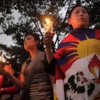 Tibetan exiles participate in a candle light procession to mark the unsuccessful revolt against China in 1959, in Gauhati, India. (AP Photo/Anupam Nath)