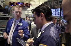 Apple shares hit record high of $600