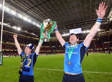 Horgan lifts the Heineken Cup with Brian O'Driscoll.