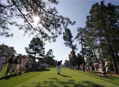 KJ Choi tees off during a practice round at Augusta.
