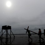 Pilgrims cross from Beal sands to the Holy Island of Lindisfarne in Northumberland, England during the annual Christian Easter pilgrimage (Owen Humphreys/PA Wire)