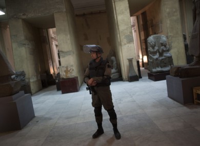 Egyptian special forces member guarding the Egyptian Museum in Cairo after looters broke in in early 2011.