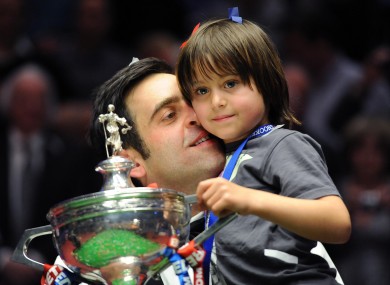Ronnie O'Sullivan celebrates his victory with his son Ronnie Jr.