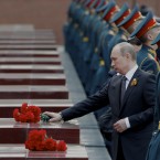 Russian President Vladimir Putin attends a wreath laying ceremony at the Tomb of Unknown Soldier on the eve of Victory Day celebration in Moscow, Russia, Tuesday, May 8, 2012. Russia is marking the surrender of Nazi Germany in World War II on May 9th. (AP Photo/Ivan Sekretarev)