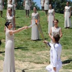 The Olympic Flame is lit by an actress dressed as the High Priestess, during a rehearsal for tomorrow's ceremony, which signals to the world that the countdown to the London 2012 Games has begun, at the Temple of Hera in Olympia, Greece, where the ancient Olympic Games took place.
