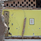 A collapsed building is seen in Cavezzo, northern Italy today. A magnitude 5.8 earthquake struck the same area of northern Italy stricken by another fatal tremor on May 20. (AP Photo/Marco Vasini)