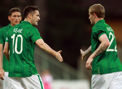 James McClean, right, congratulates Keane after the game's opening goal.