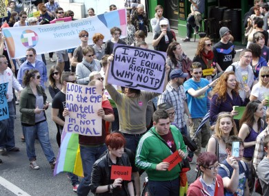 LGBT campaigners marching for civil marriage equality in August last year