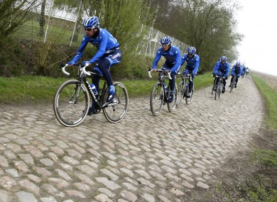 Members of Team SaxoBank ride out.