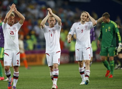 Denmark's Michael Krohn-Dehli, centre, Tobias Mikkelsen, left, and Denmark's William Kvist.