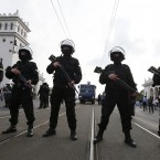 Polish police block a bridge outside the stadium where the Euro 2012 soccer championship group A match between Poland and Russia is to be played in Warsaw, Poland , Tuesday, June 12, 2012. (AP Photo/Czarek Sokolowski)