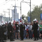 Polish police block a bridge outside the stadium where the Euro 2012 soccer championship group A match between Poland and Russia is to be played in Warsaw, Poland , Tuesday, June 12, 2012. (AP Photo/Czarek Sokolowski)