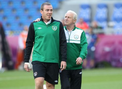 Trap has a word in Dunne's ear.