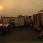 Firefighters get ready to head into neighbourhoods which were caught by the Waldo Canyon fire. (AP Photo/Bryan Oller/PA)