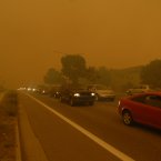 People flee the Waldo Canyon fire at it burns through neighbourhoods west of Colorado Springs yesterday. (AP Photo/Bryan Oller/PA)