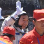 Astronaut Jing Haipeng comes out of the re-entry capsule (Photo by tonglaga/Chinafotopress)