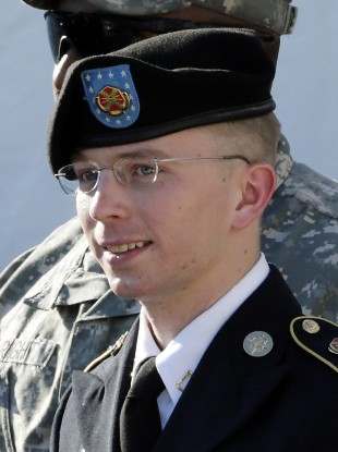 Bradley Manning, seen here leaving court last month, is charged with aiding 'The Enemy' by helping to distribute classified US diplomatic cables.