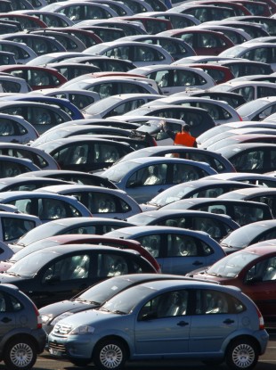 Cars outside Peugeot's Aulnay plant, which will close
