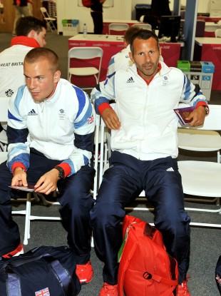 Tom Cleverley (left) and Ryan Giggs wait in the Olympic Village.