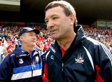 Waterford manager Michael Ryan and Cork counterpart Jimmy Barry-Murphy at the final whistle.